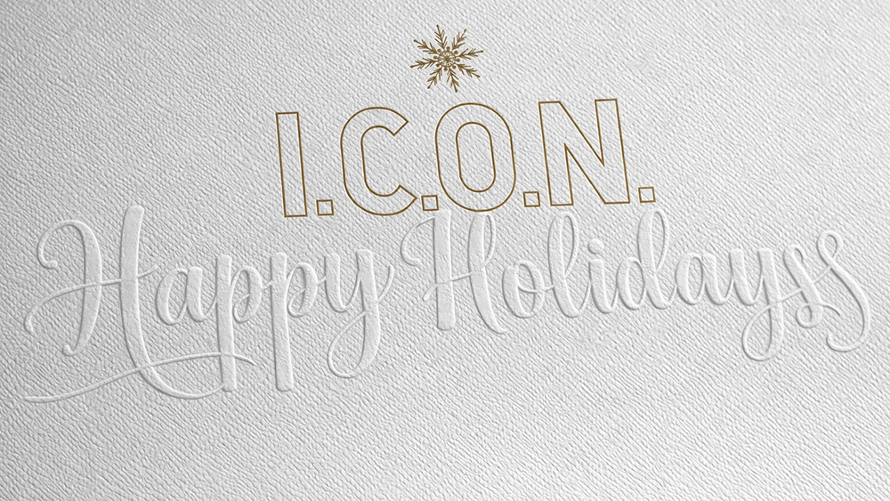Blind embossed logo on a luxury paper gift bag showing subtle texture and depth