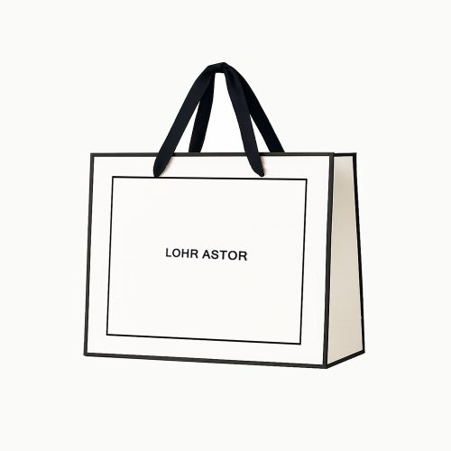 Custom white paper bag with black border design, embossed logo, black knotted grosgrain ribbon handle, durable and stylish for apparel packaging.