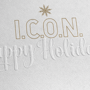 Blind embossed logo detail on a luxury paper gift bag